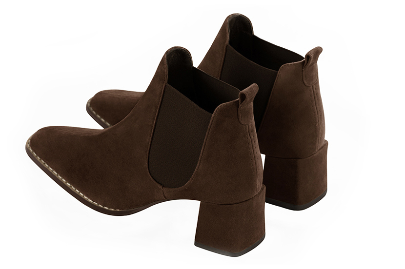 Dark brown women's ankle boots, with elastics. Square toe. Medium block heels. Rear view - Florence KOOIJMAN